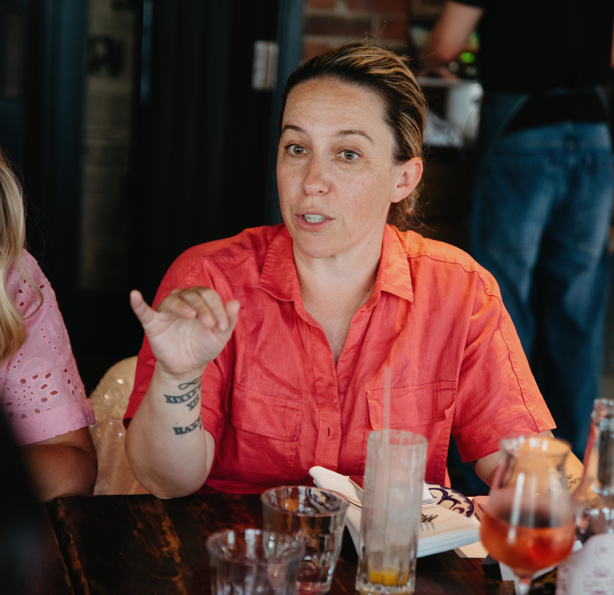 Nikki McKnight speaking at High Vibe Women